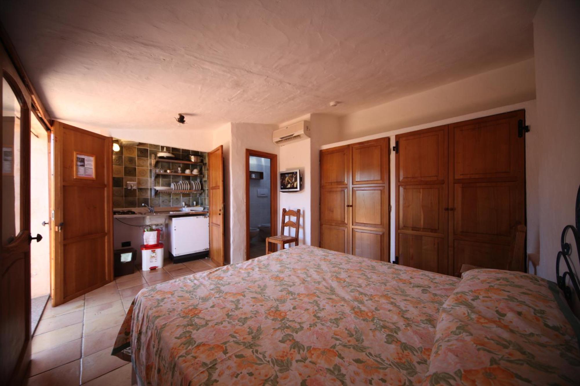 Residenza Capriccioli Aparthotel ปอร์โตแชร์โว ภายนอก รูปภาพ